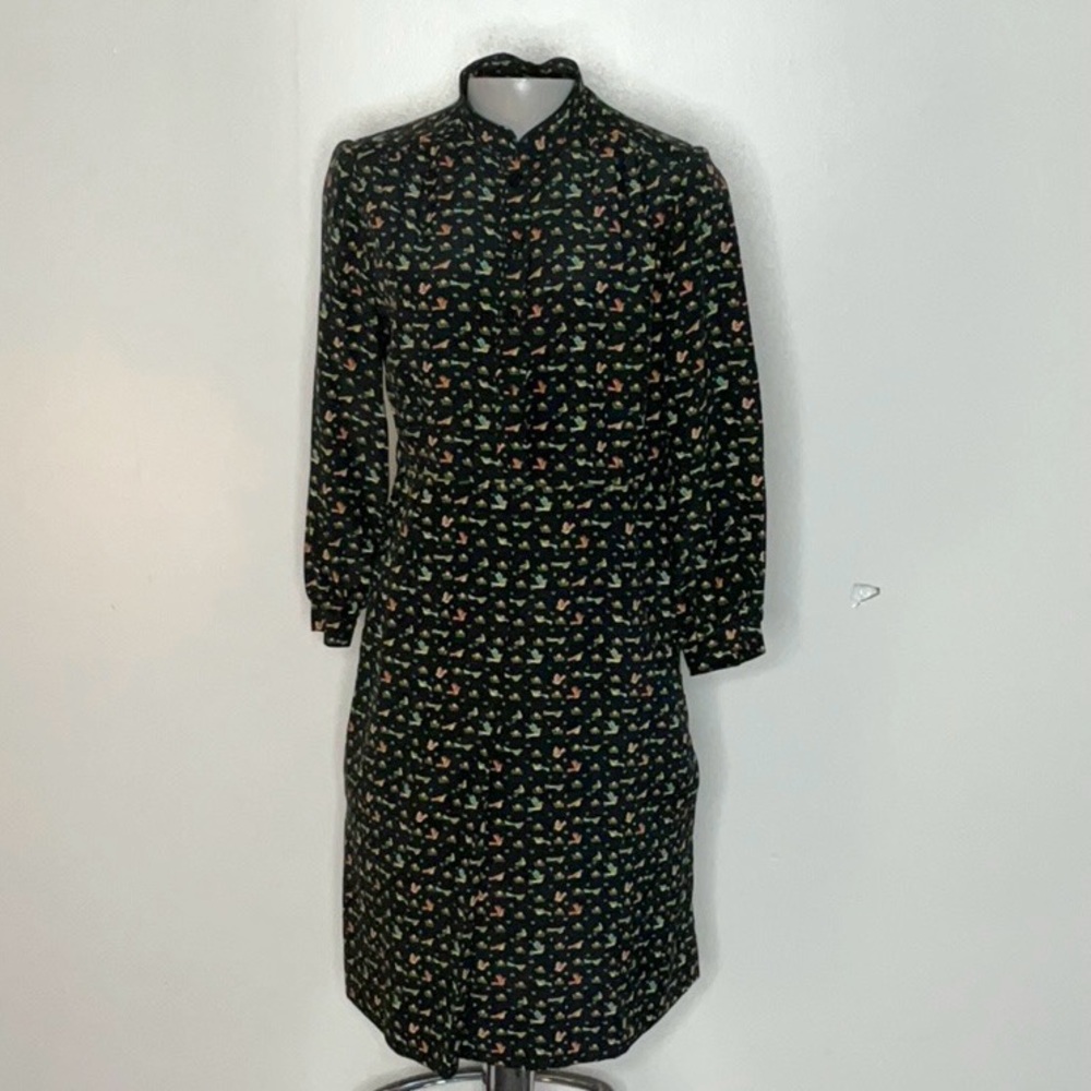 Beautiful dress with small print colorful birds on a field of blueish black BX26